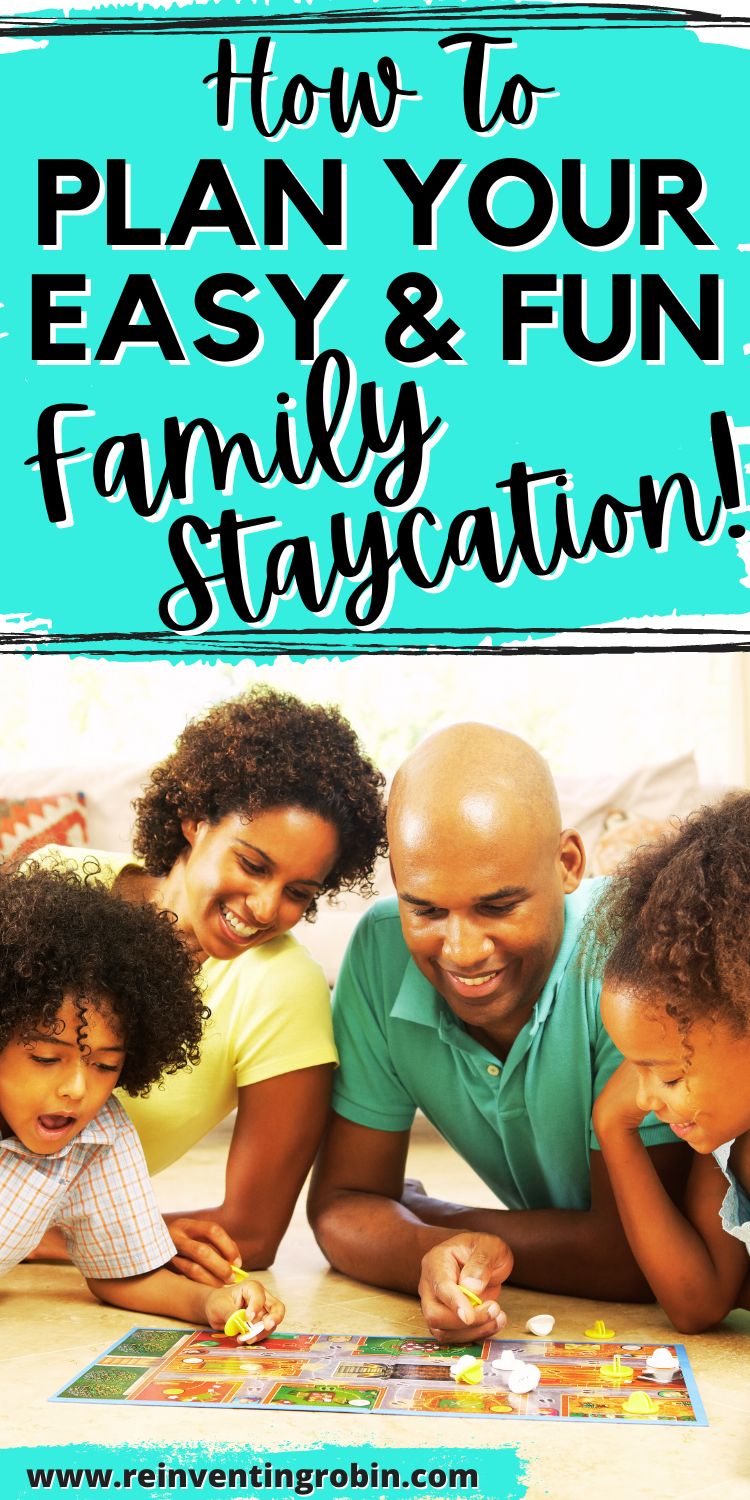 A family with mom, dad and two kids playing a board game and the text above them saying How to Plan Your Easy and Fun Family Staycation! www.reinventingrobin.com