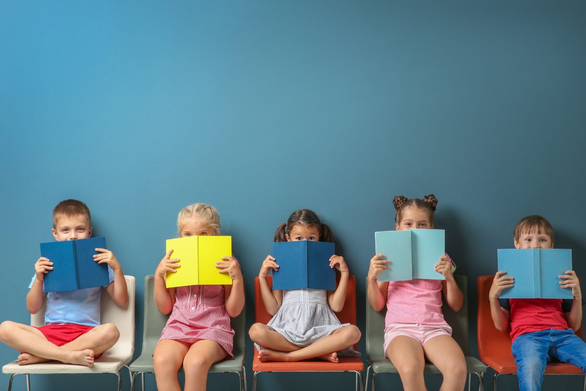 Kids sitting and reading together